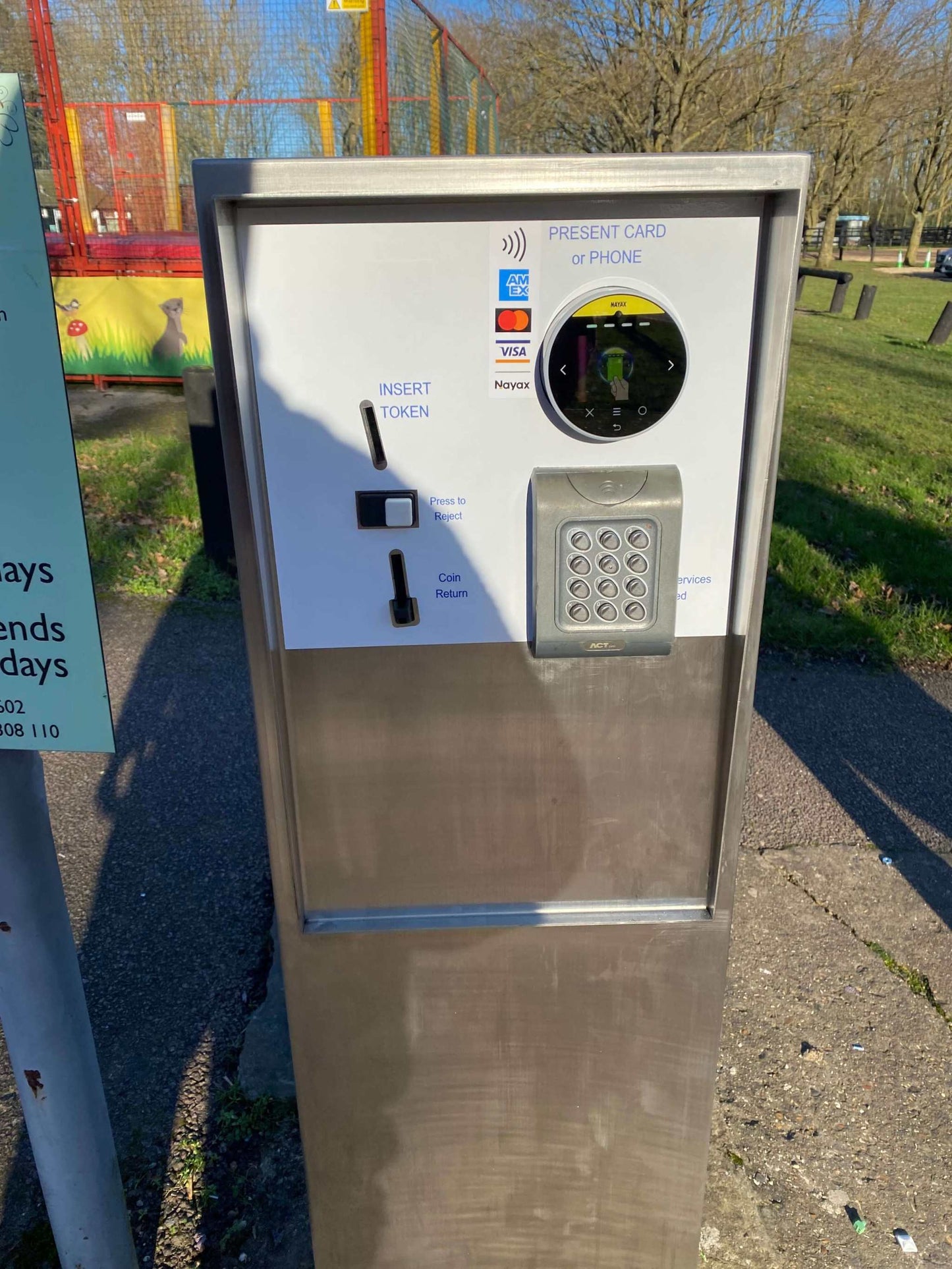 Evolve CPS100 Fixed Fee Parking Machine in outdoor setting, showing user-friendly interface.