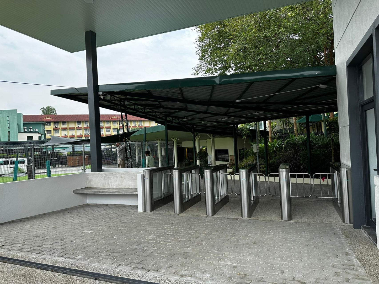 Evolve ES200 External Speed Lane Gate for outdoor use with stainless steel and Plexiglas design.