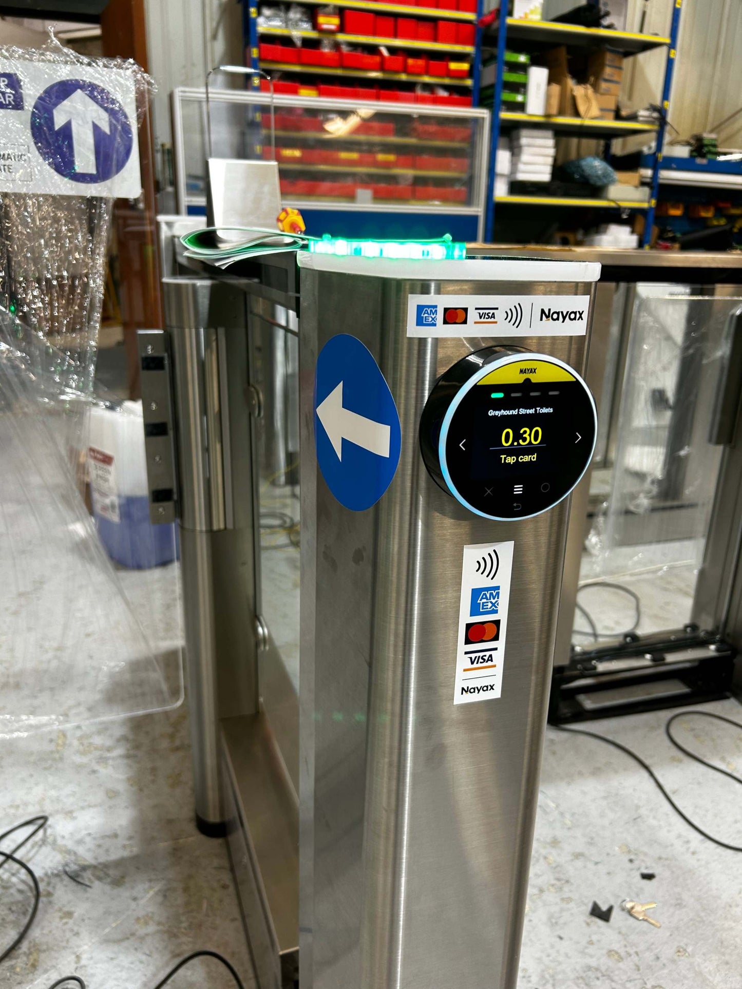 Nayax Contactless Reader Nayax Contactless Reader Evolve Nayax Contactless Reader installed on a payment station in an industrial setting.
