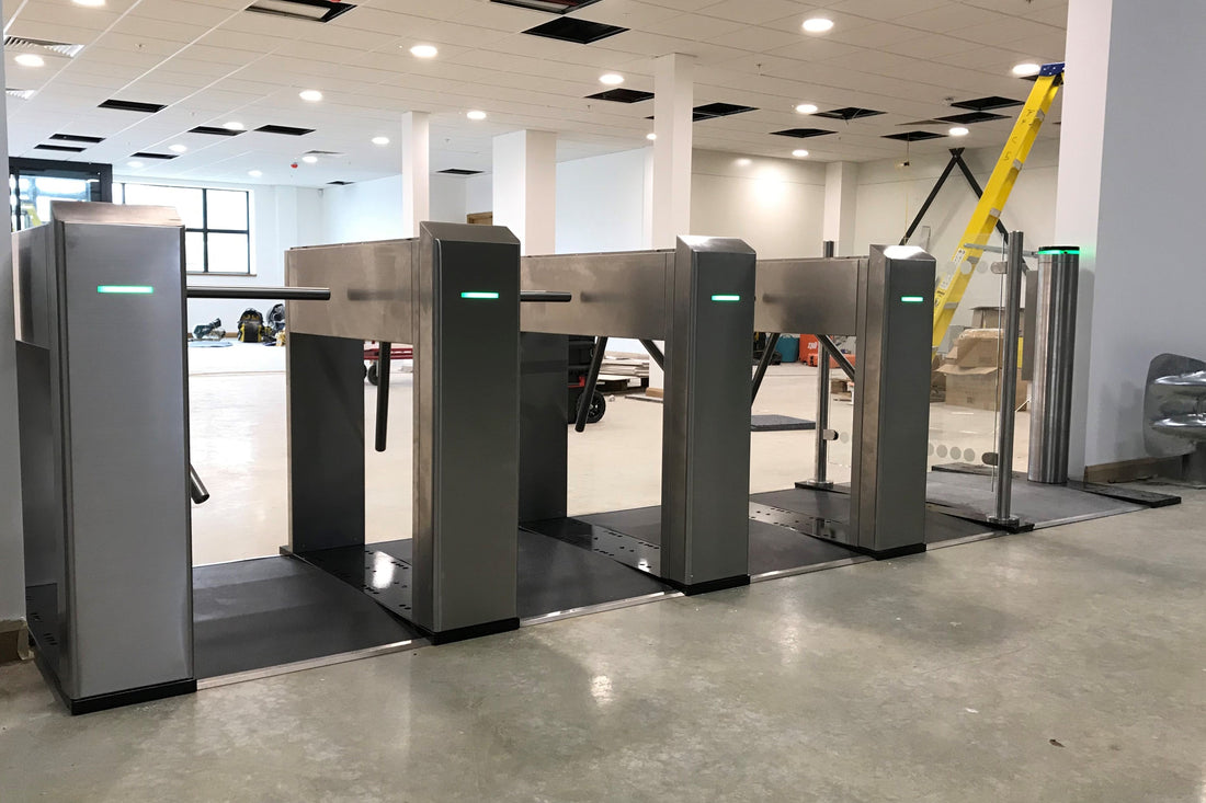 Image of speed gates in a modern building, illustrating why speed gates are replacing turnstiles in modern buildings.