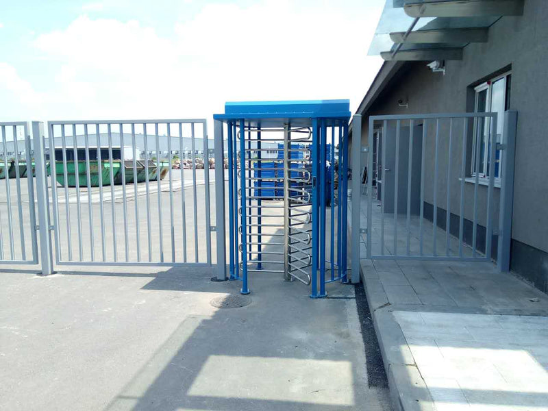 Full Height Turnstiles installed at a facility entrance for enhanced security and controlled access.