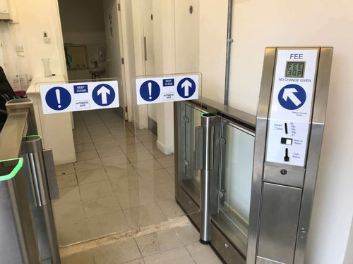 ES150 Coin Operated Speed Gate with paddle gates and fee display in a modern entrance.